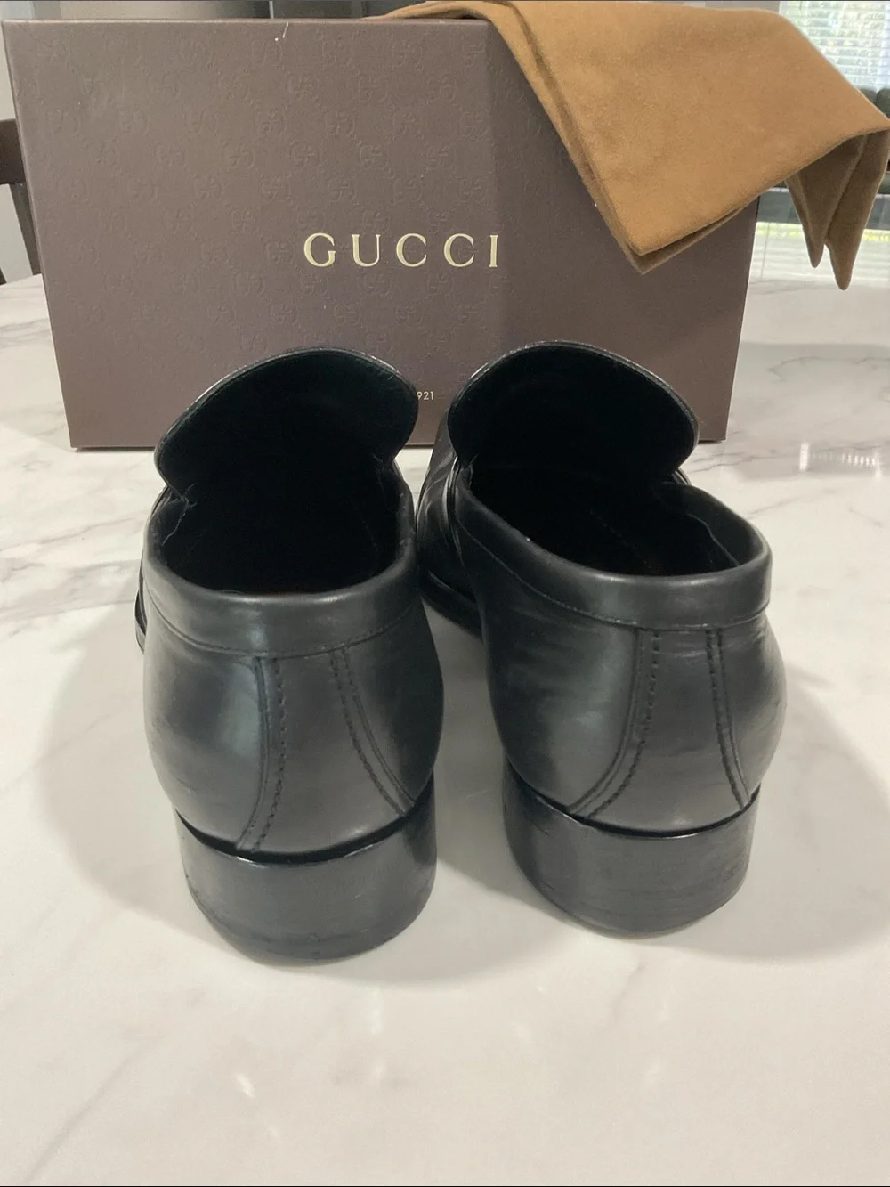 Gucci Black Leather Men’s Slip-On Loafers with Silver GG Buckle